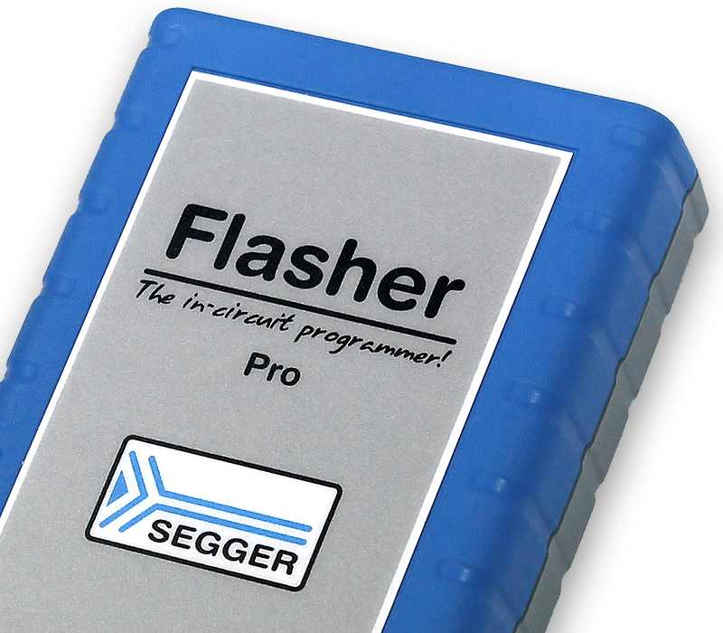 A rectangular device labeled "Flasher Pro" prominently features a silver background with black text. Below, the SEGGER logo is displayed. The device is encased in a blue rubber material, designed for in-circuit programming.