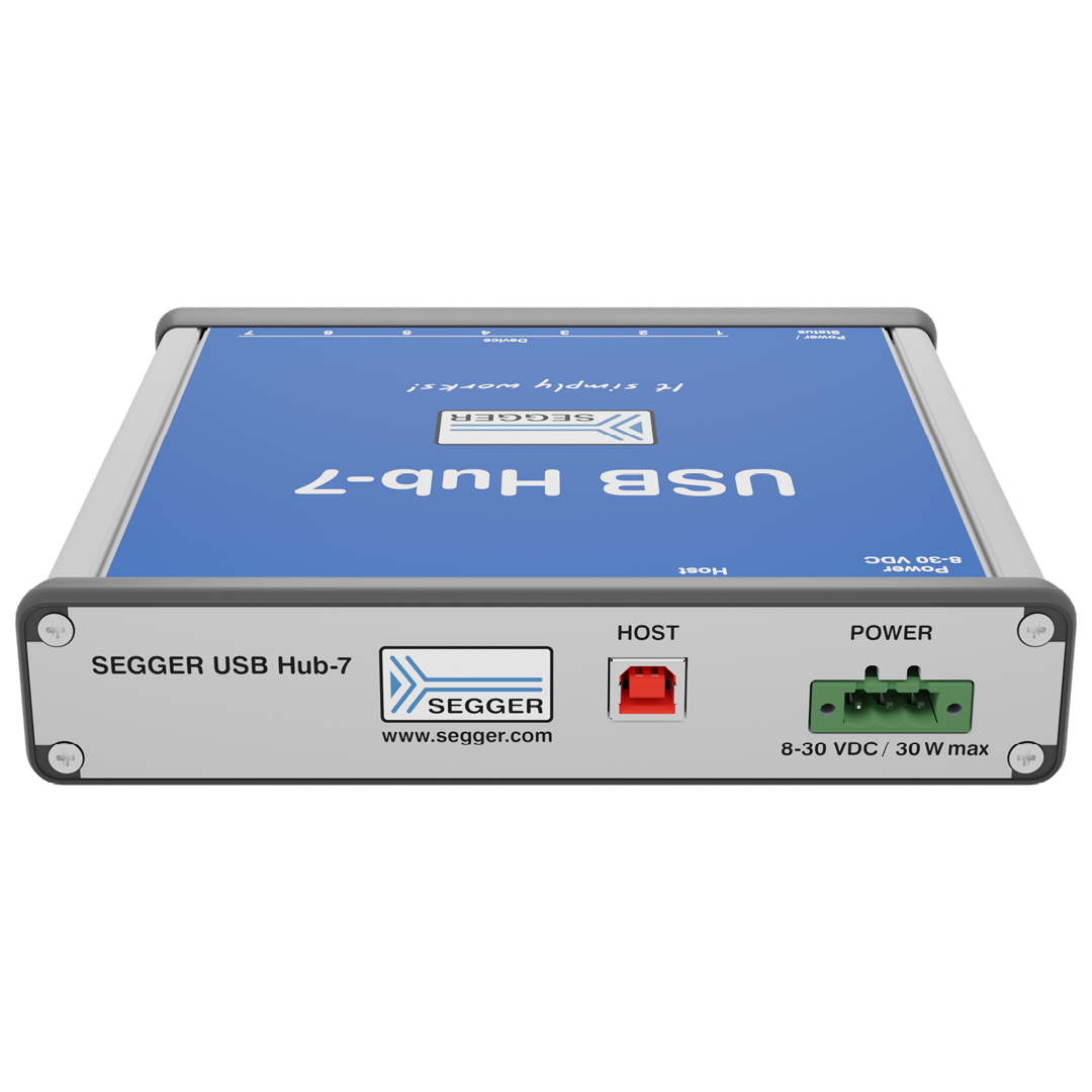A SEGGER USB Hub-7 is shown, featuring a blue surface with the SEGGER logo. It has labeled ports on one side, including a red "HOST" port and a green "POWER" connection, indicating power requirements of 8-30 VDC and a maximum of 30 W.